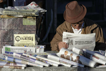 Man reading a newspaper in Tirana Marcel Crozet CC BY-NC-ND 2.0 via Store norske leksikon Man reading a newspaper in Tirana Marcel Crozet CC BY-NC-ND 2.0 via Store norske leksikon